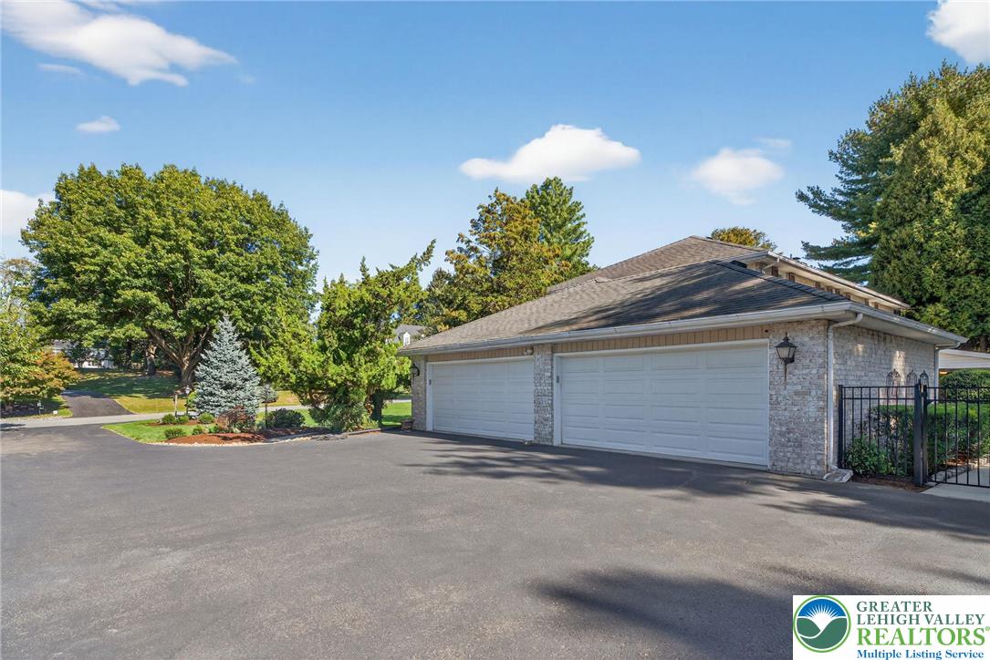 1830 Sherwood Road Allentown, PA 18103 - Photo 51 of 68 a view of a house with a street and a garage