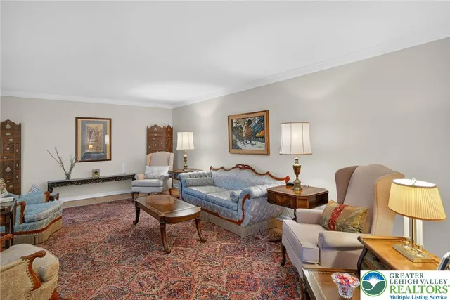 a kitchen with stainless steel appliances granite countertop a stove microwave and cabinets