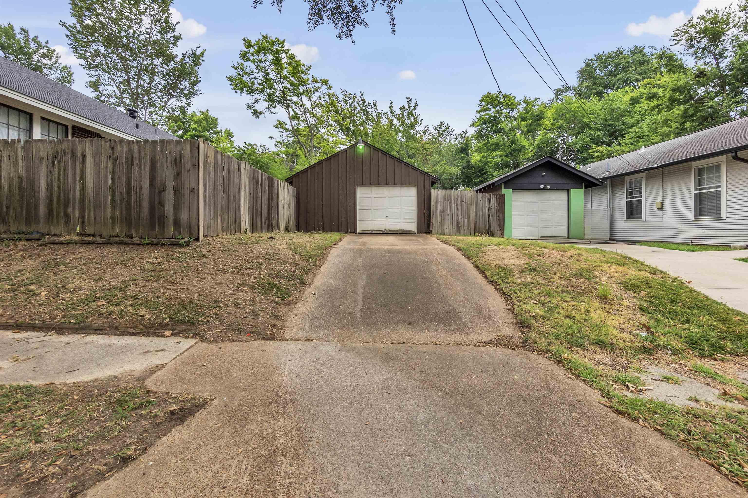 2579 Hale Avenue Memphis, TN 38112 - Photo 21 of 21 a house with a tree in front of it