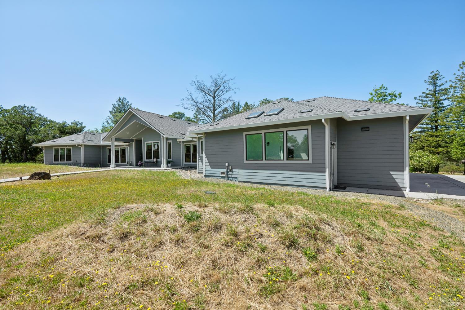 4665 Upper Ridge Road Santa Rosa, CA 95404 - Photo 65 of 71 a front view of a house with a garden