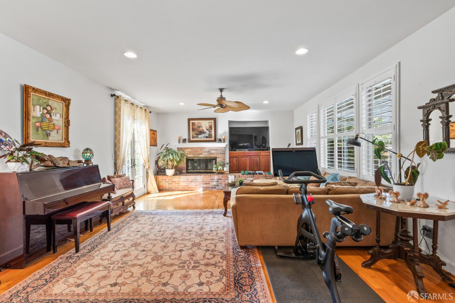 103 Abalone Cove Hercules, CA 94547 - Photo 20 of 84 a living room with fireplace furniture and a flat screen tv