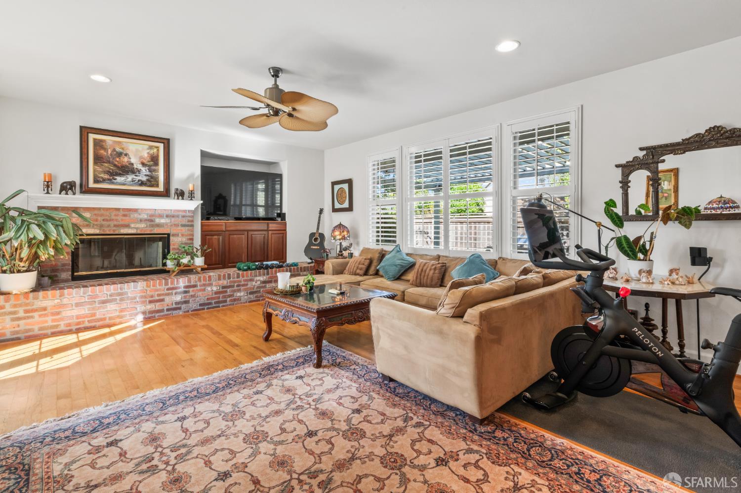 103 Abalone Cove Hercules, CA 94547 - Photo 21 of 84 a living room with furniture a fireplace and a flat screen tv