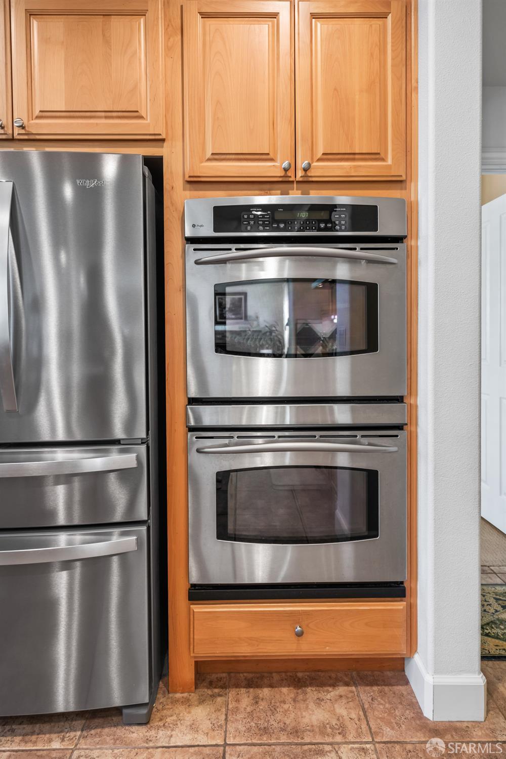 103 Abalone Cove Hercules, CA 94547 - Photo 26 of 84 a stove top oven sitting inside of a kitchen