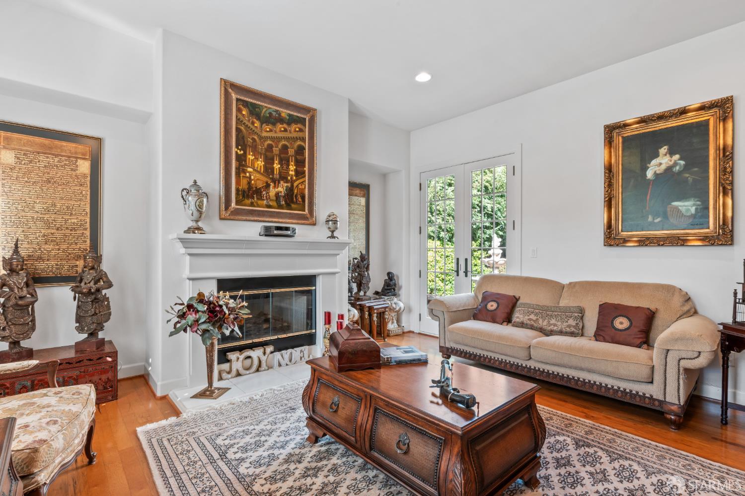 103 Abalone Cove Hercules, CA 94547 - Photo 3 of 84 a living room with furniture and a fireplace