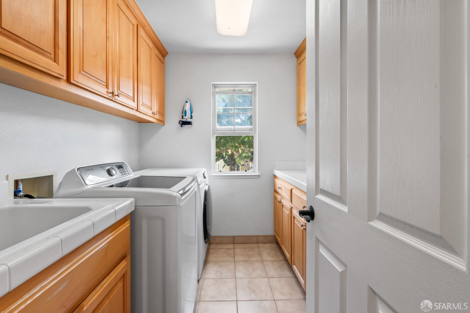 103 Abalone Cove Hercules, CA 94547 - Photo 34 of 84 a utility room with dryer and washer