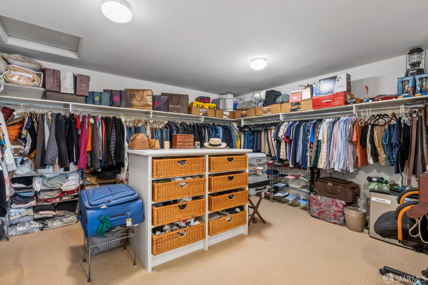103 Abalone Cove Hercules, CA 94547 - Photo 44 of 84 a view of walk in closet with clothes and shoes
