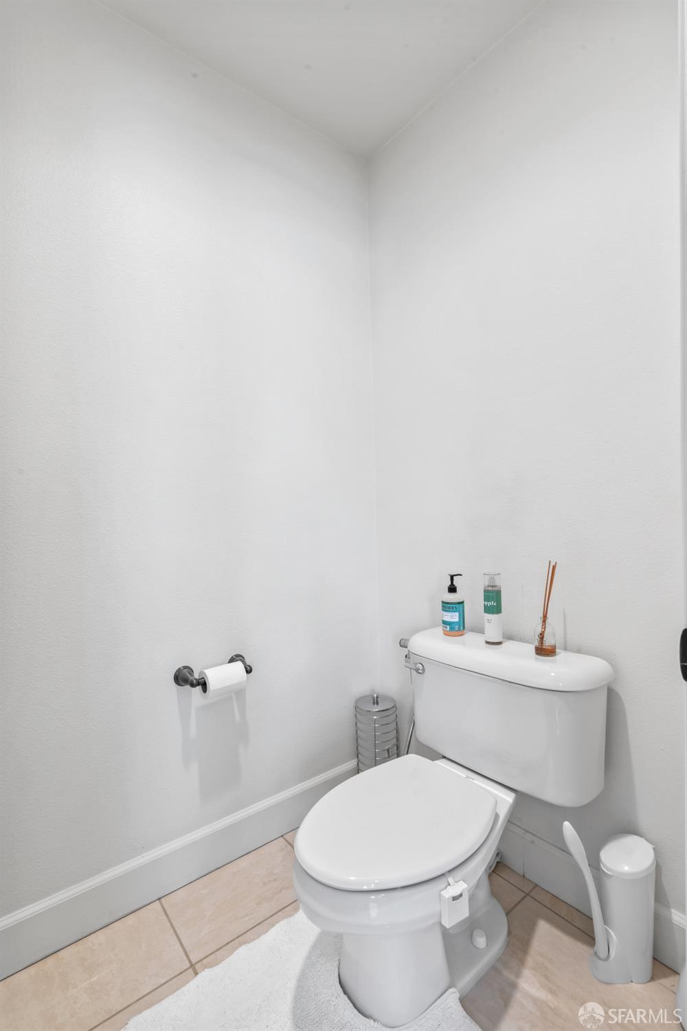 103 Abalone Cove Hercules, CA 94547 - Photo 52 of 84 a white toilet sitting next to a white sink and vanity