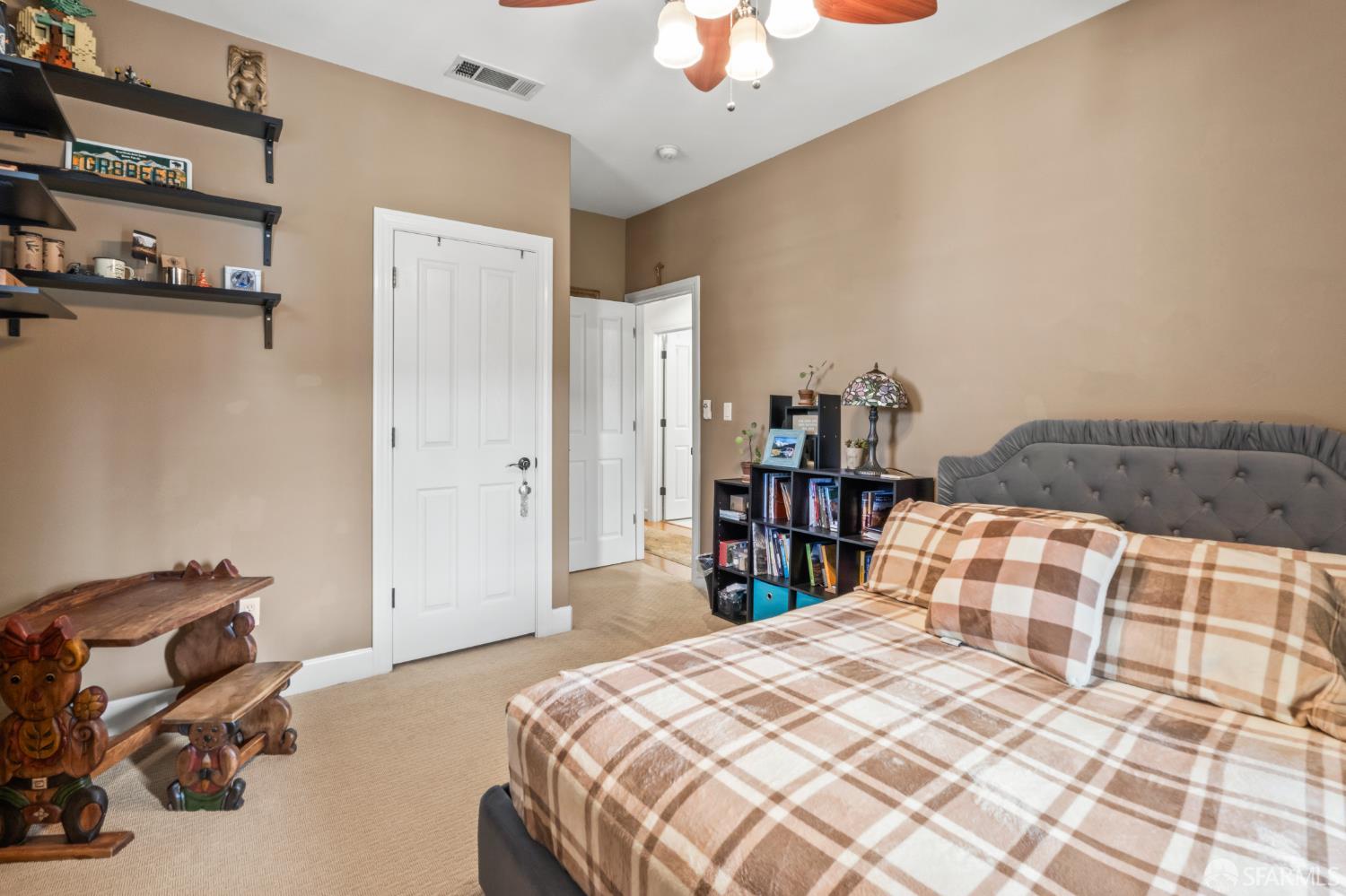 103 Abalone Cove Hercules, CA 94547 - Photo 56 of 84 a bedroom with a bed and a dresser