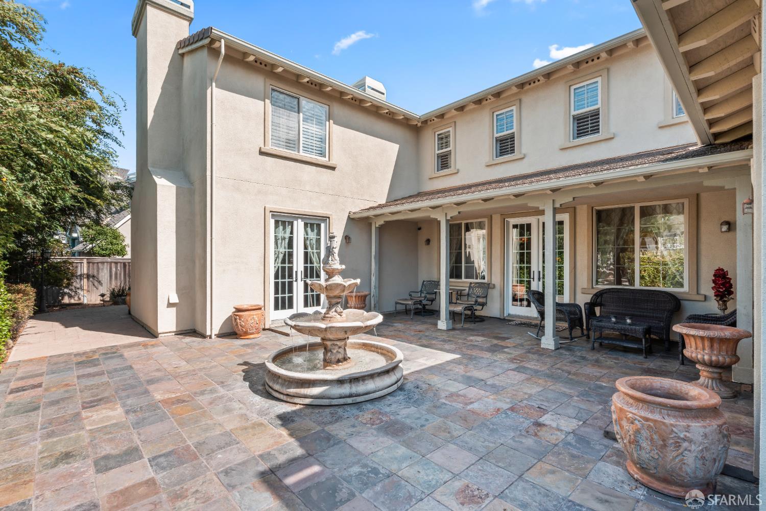 103 Abalone Cove Hercules, CA 94547 - Photo 65 of 84 a view of a patio with table and chairs and potted plants