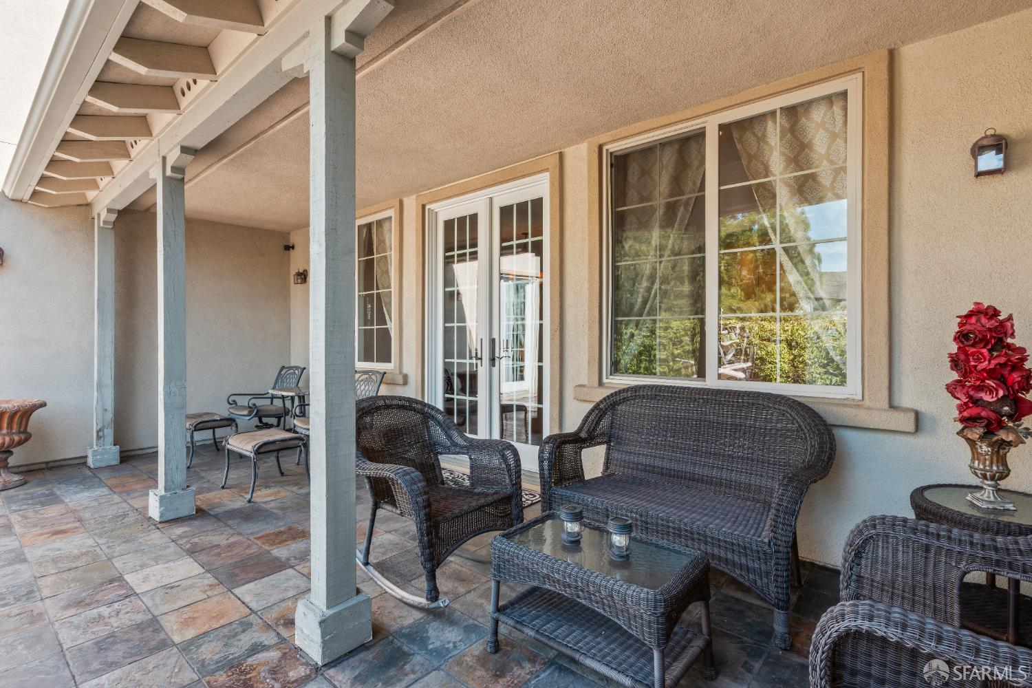 103 Abalone Cove Hercules, CA 94547 - Photo 68 of 84 a living room with furniture and a potted plant