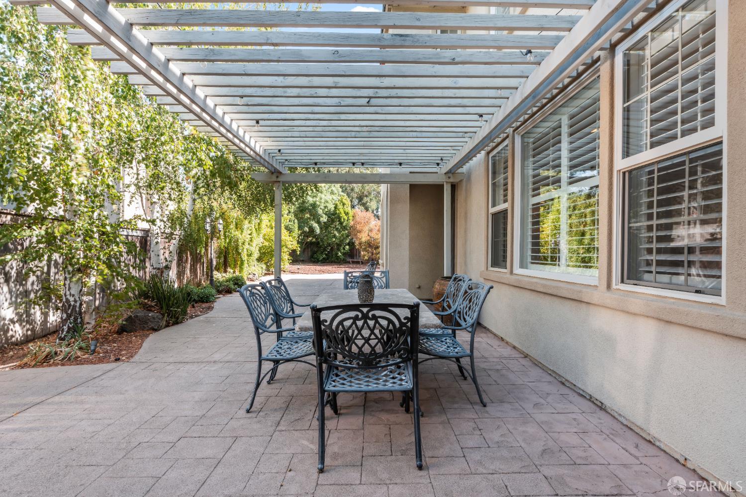 103 Abalone Cove Hercules, CA 94547 - Photo 69 of 84 a view of a patio with a table and chairs