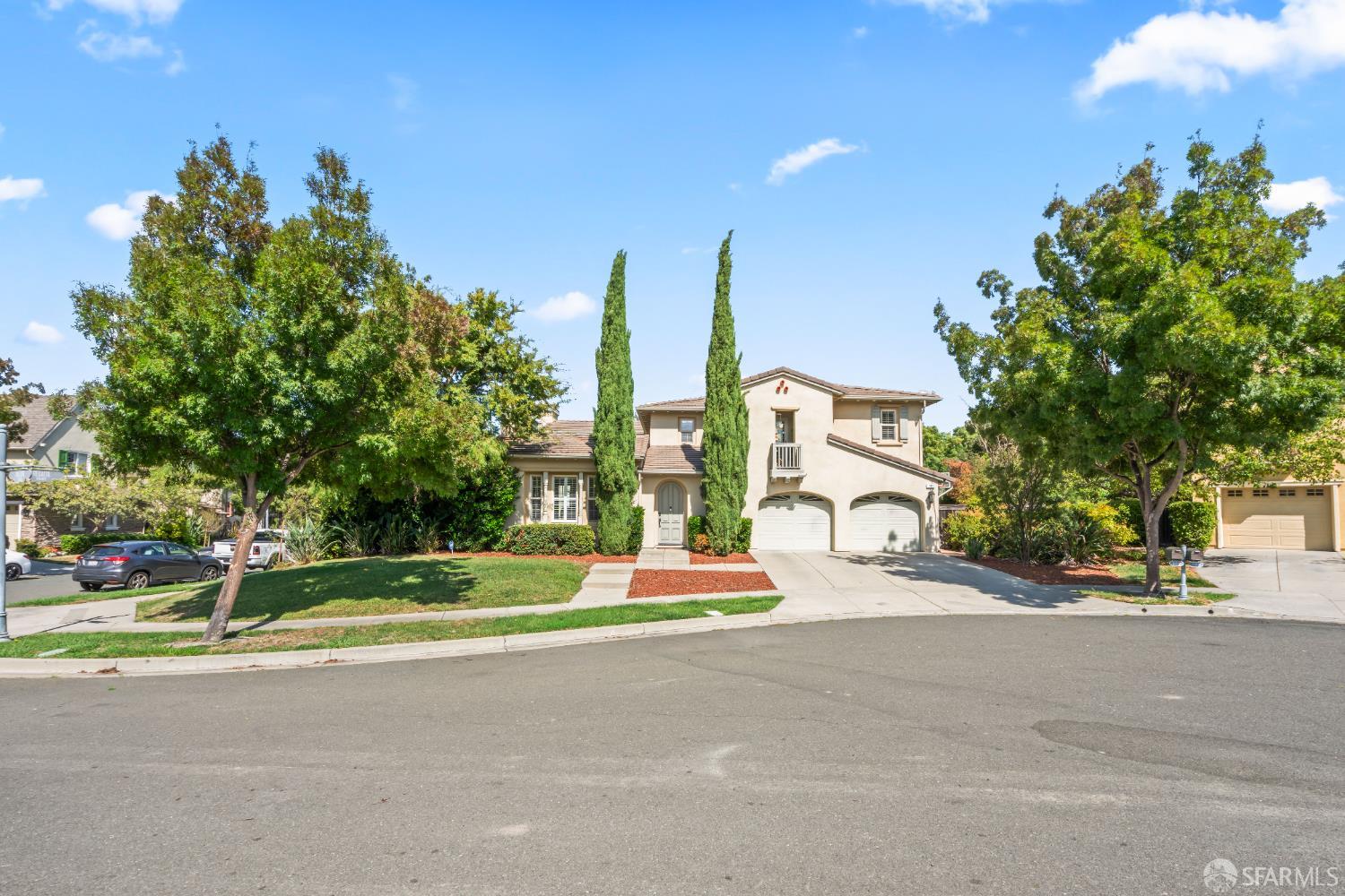 103 Abalone Cove Hercules, CA 94547 - Photo 76 of 84 a front view of a house with a garden and trees