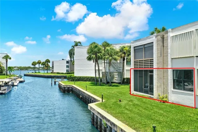 a view of a lake with a house