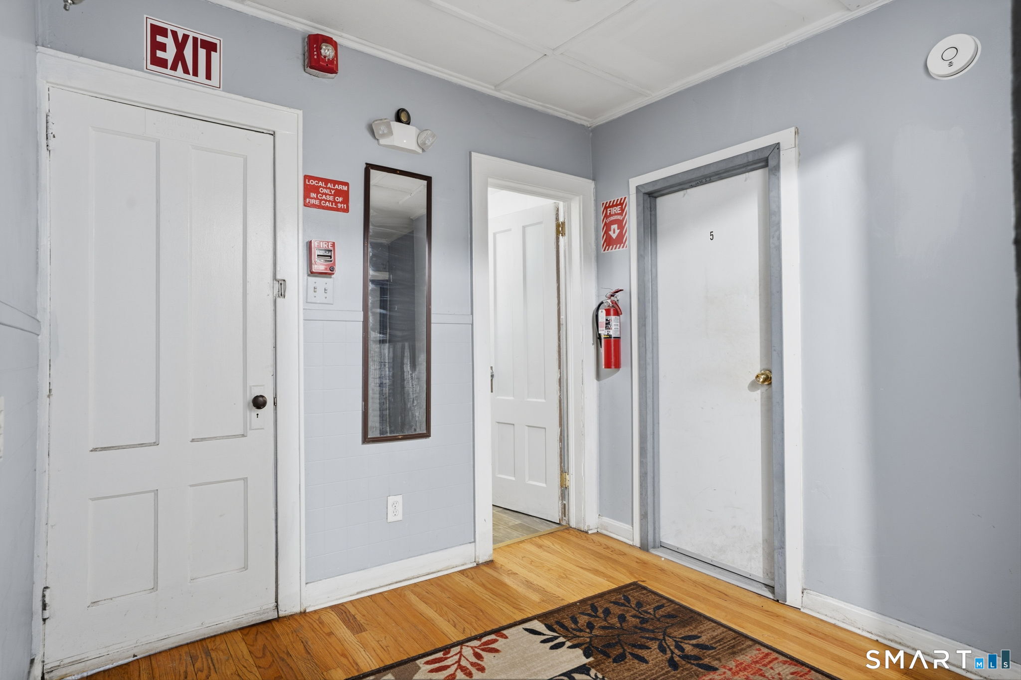 49 Birch Street Manchester, CT 06040 - Photo 19 of 30 a bedroom with a bed and a window