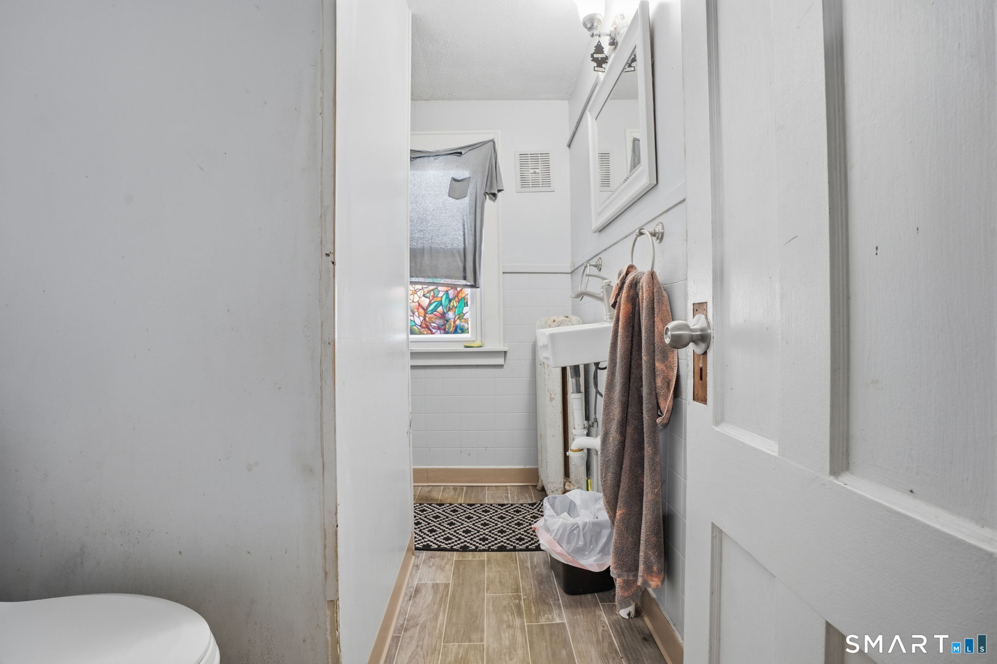 49 Birch Street Manchester, CT 06040 - Photo 21 of 30 a bathroom with a toilet and a shower