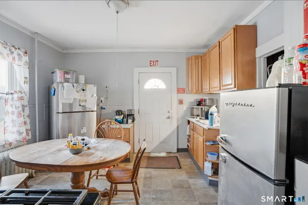 a view of a dining room with furniture