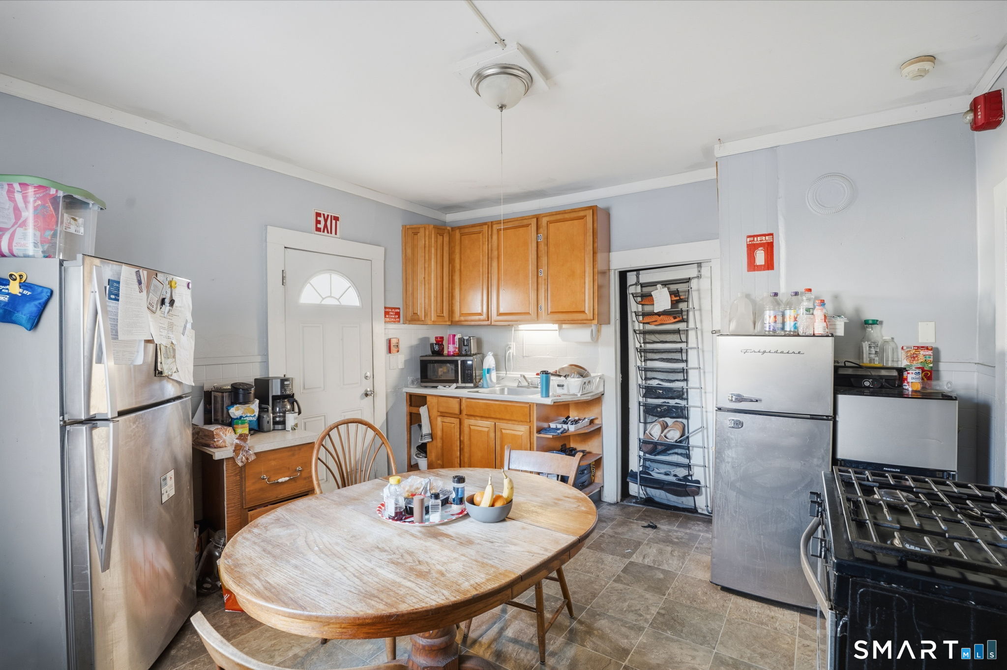 49 Birch Street Manchester, CT 06040 - Photo 5 of 30 a kitchen with refrigerator and stove