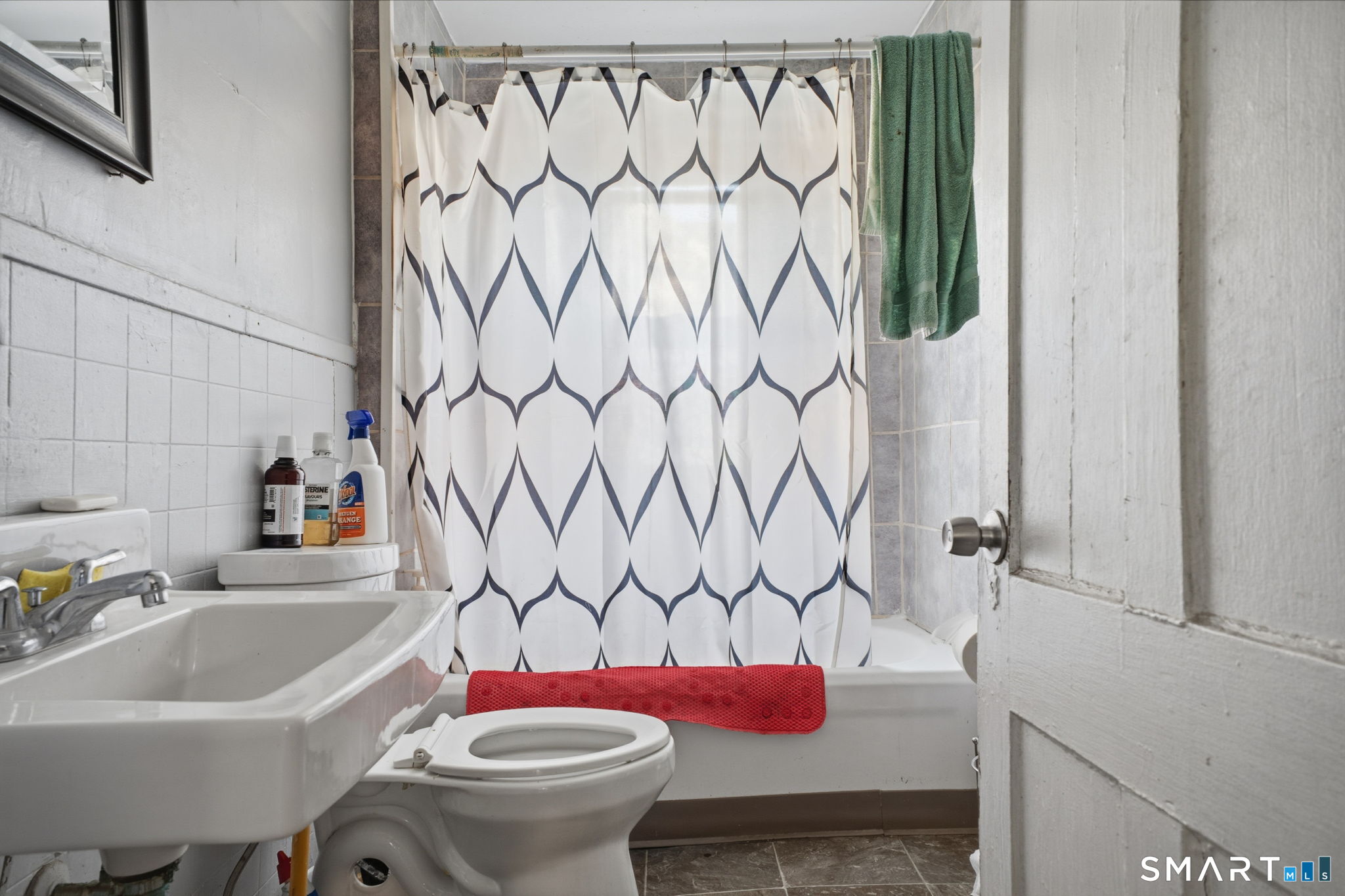 49 Birch Street Manchester, CT 06040 - Photo 7 of 30 a bathroom with a sink toilet and shower