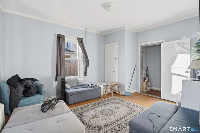 a living room with furniture and a couch