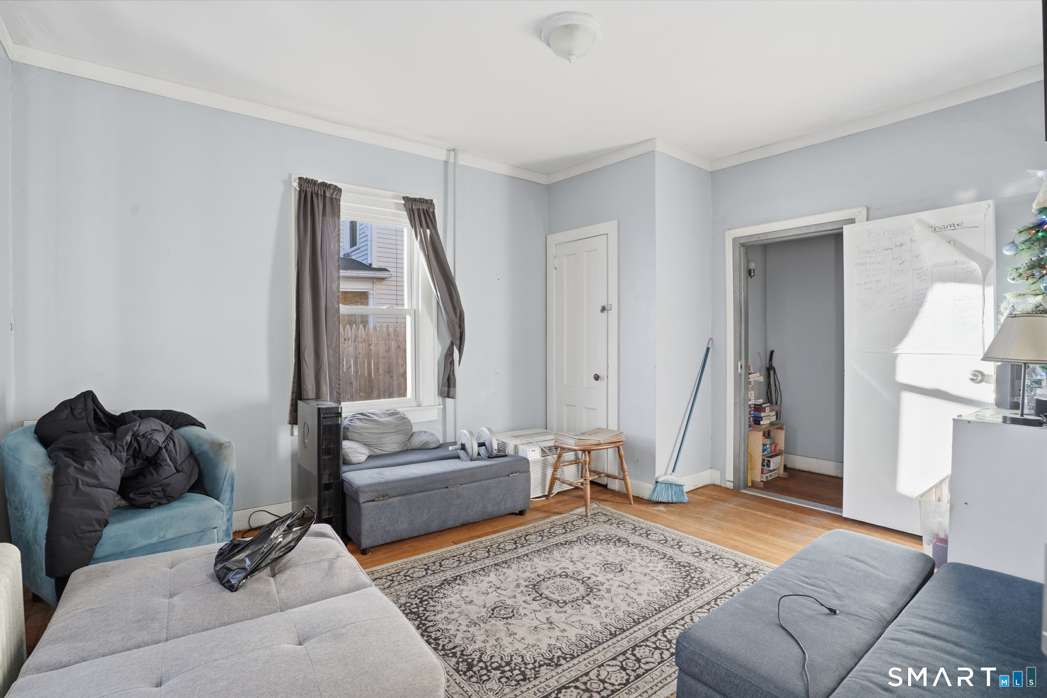 49 Birch Street Manchester, CT 06040 - Photo 10 of 30 a living room with furniture and a couch