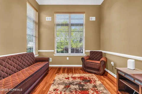 a kitchen with stainless steel appliances granite countertop wooden cabinets a stove top oven a sink and dishwasher