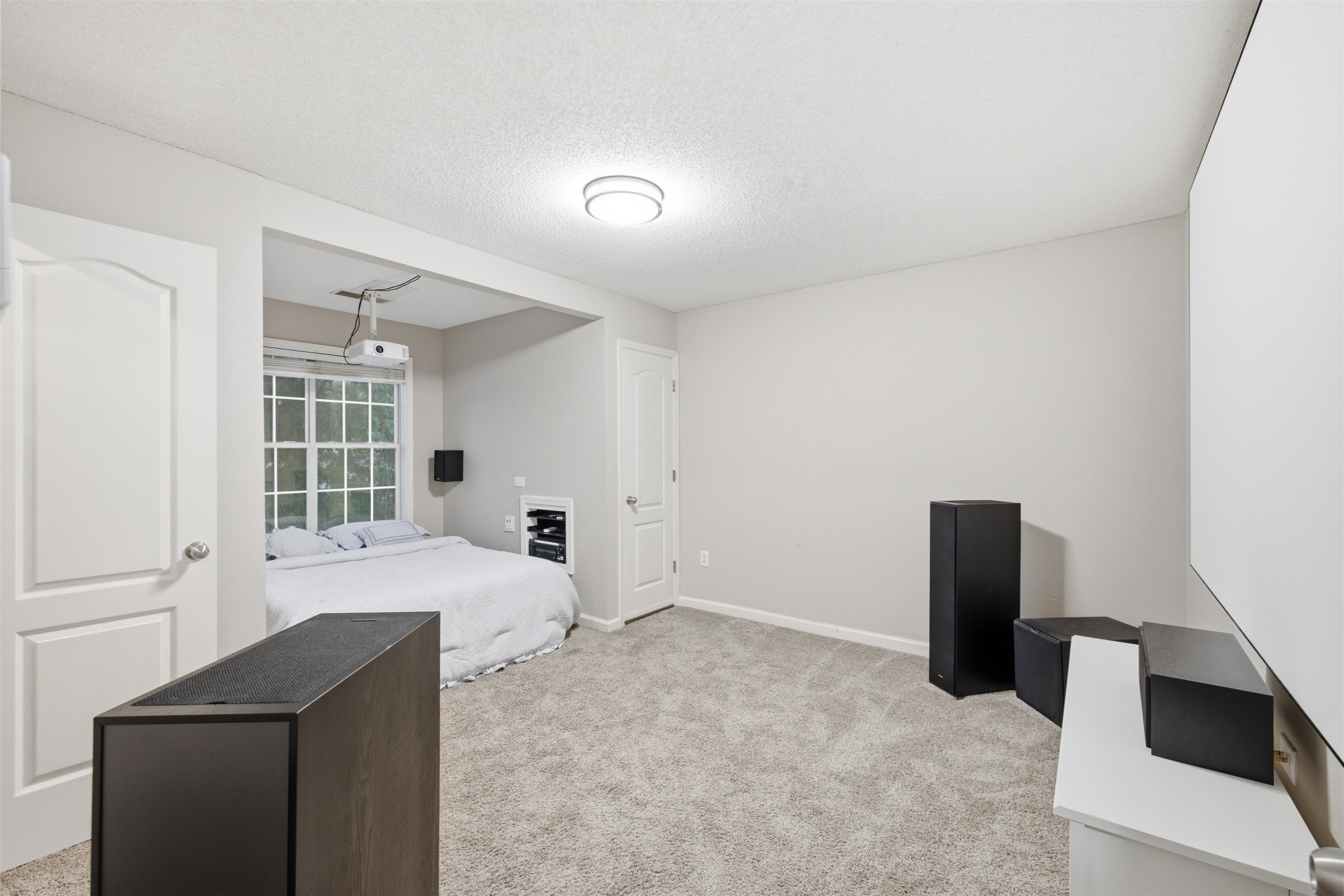 96 Berryfield Cove Collierville, TN 38017 - Photo 27 of 39 Carpeted room featuring a built-in bed alcove, a multi-pane window, and a flush-mount ceiling light fixture
