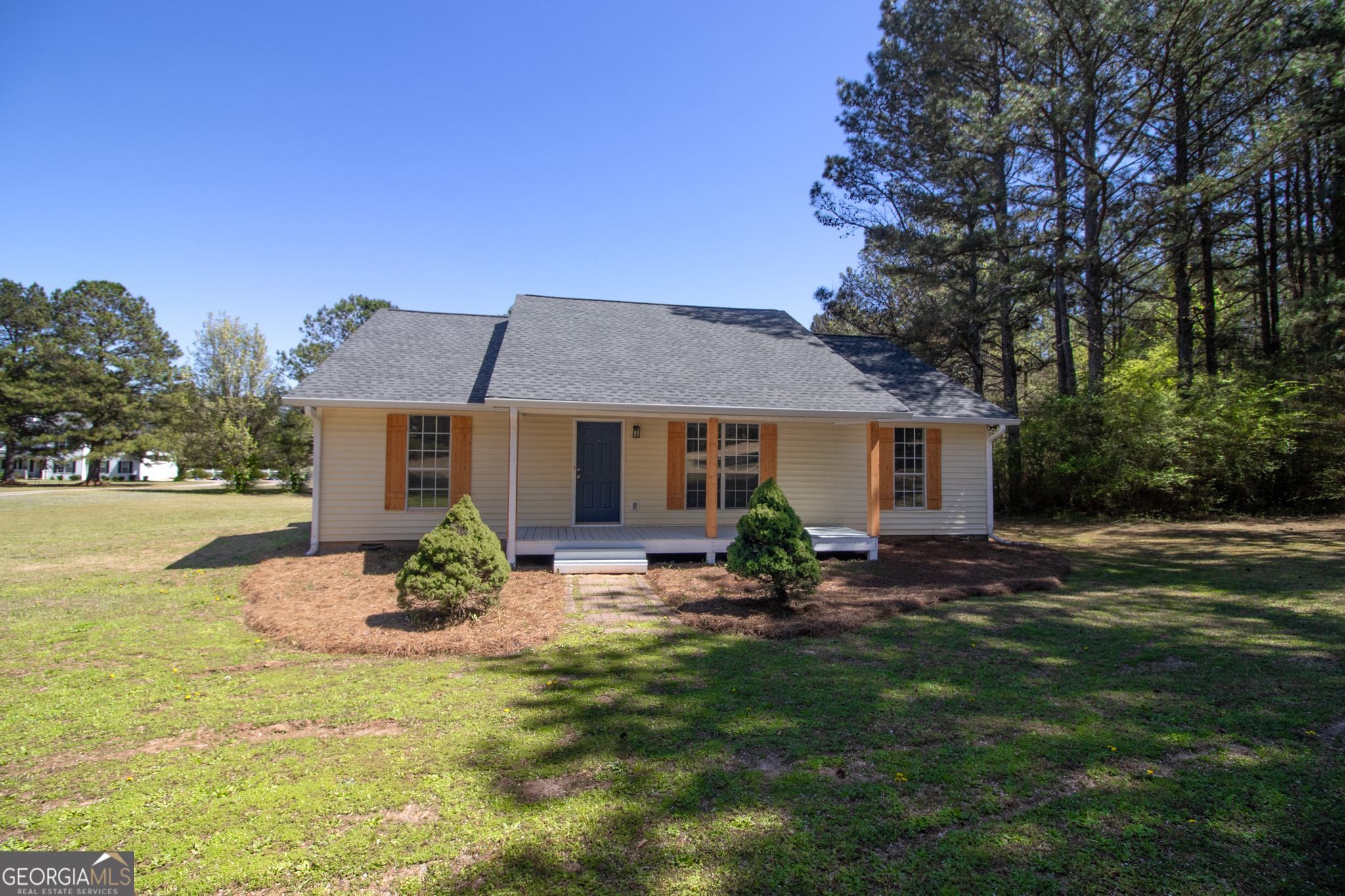 60 Smoak Field Road Griffin, GA 30223 - Photo 1 of 1 a front view of a house with garden