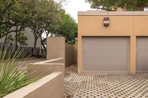 a view of a house with a yard patio and sitting area