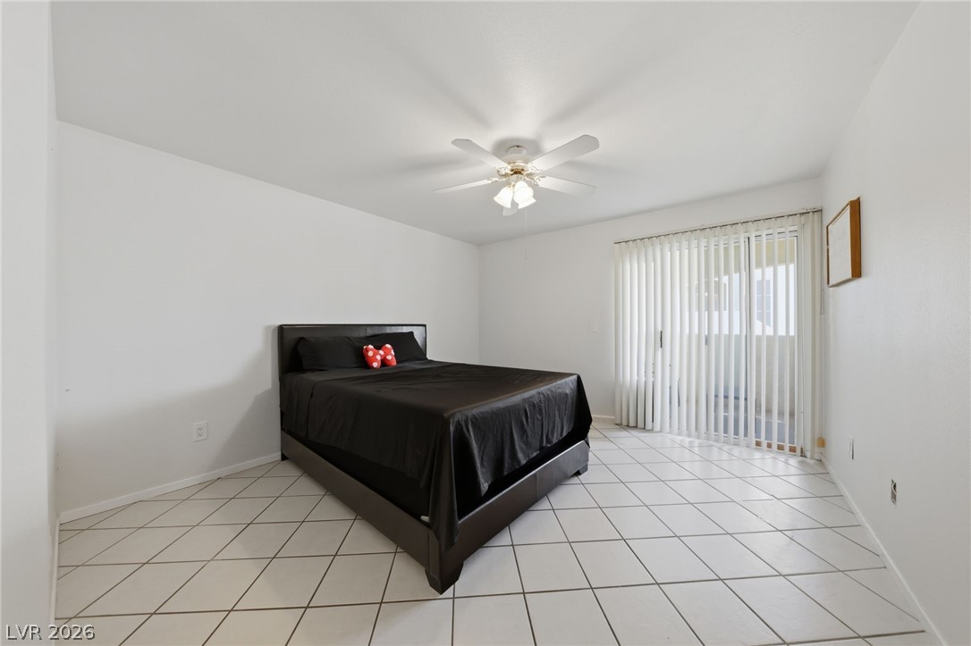 698 South Racetrack Road, Unit 1221 Henderson, NV 89015 - Photo 21 of 24 PRIMARY BEDROOM WITH BALCONY ACCESS