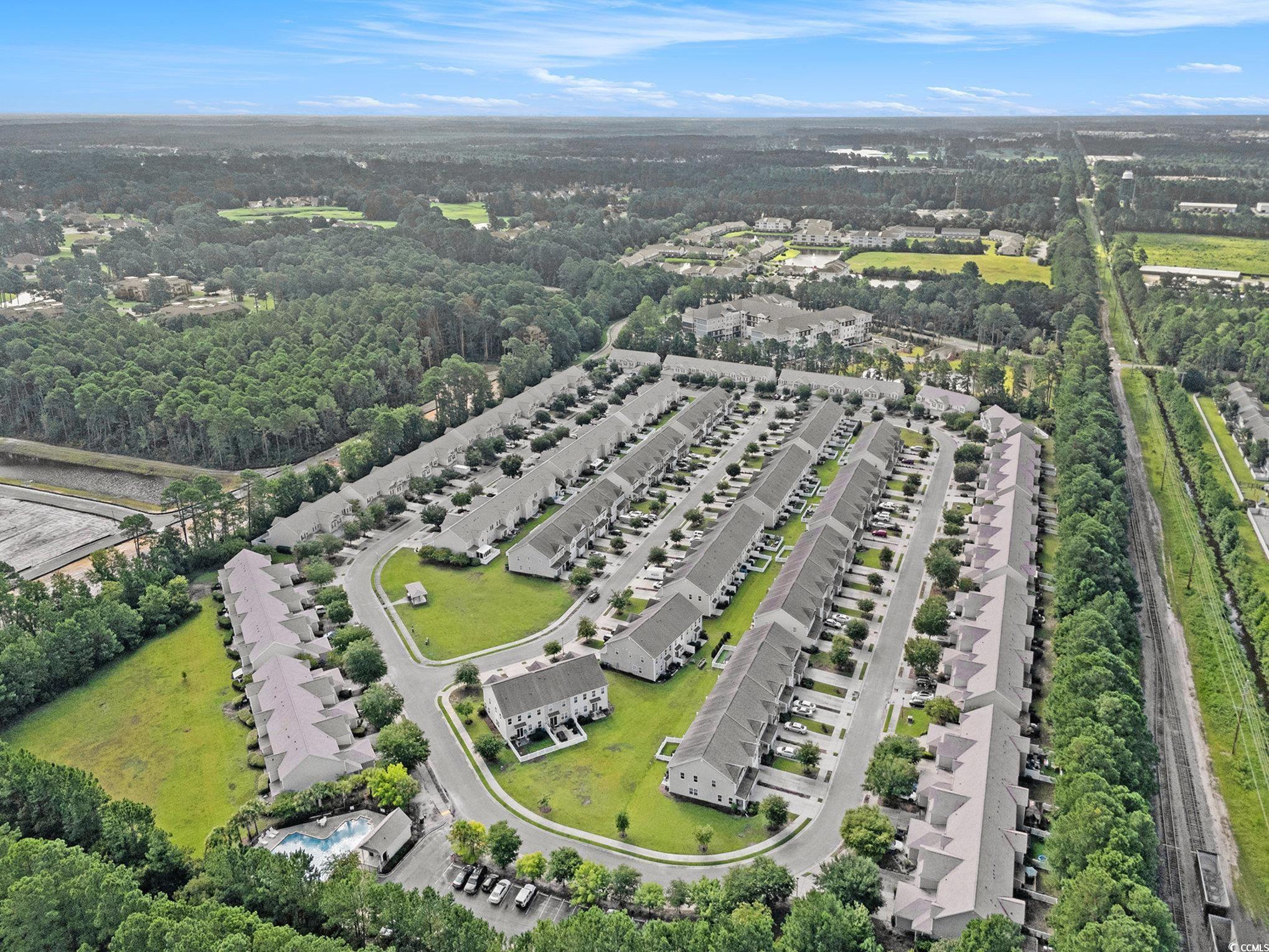 1038 Tee Shot Drive, Unit 1038 Conway, SC 29526 - Photo 40 of 40 Aerial perspective of suburban area with a tree filled landscape