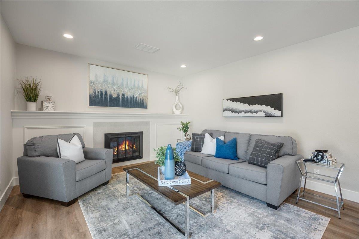 7106 Brooktree Way San Jose, CA 95120 - Photo 12 of 31 a living room with furniture and a fireplace