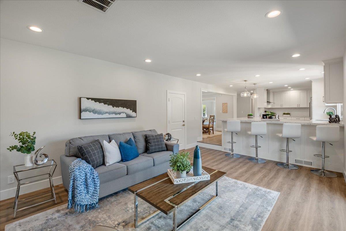 7106 Brooktree Way San Jose, CA 95120 - Photo 13 of 31 a living room with furniture and kitchen view