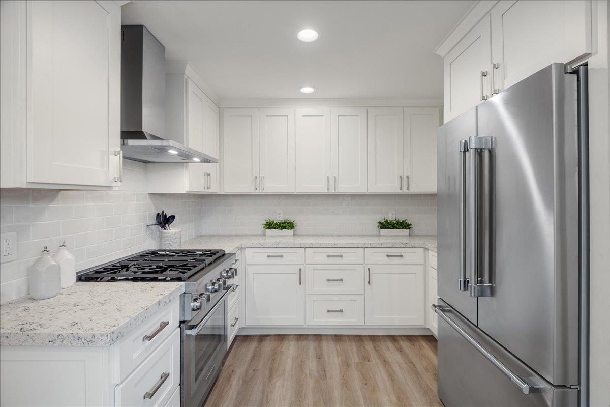 7106 Brooktree Way San Jose, CA 95120 - Photo 16 of 31 a kitchen with stainless steel appliances a refrigerator sink and cabinets