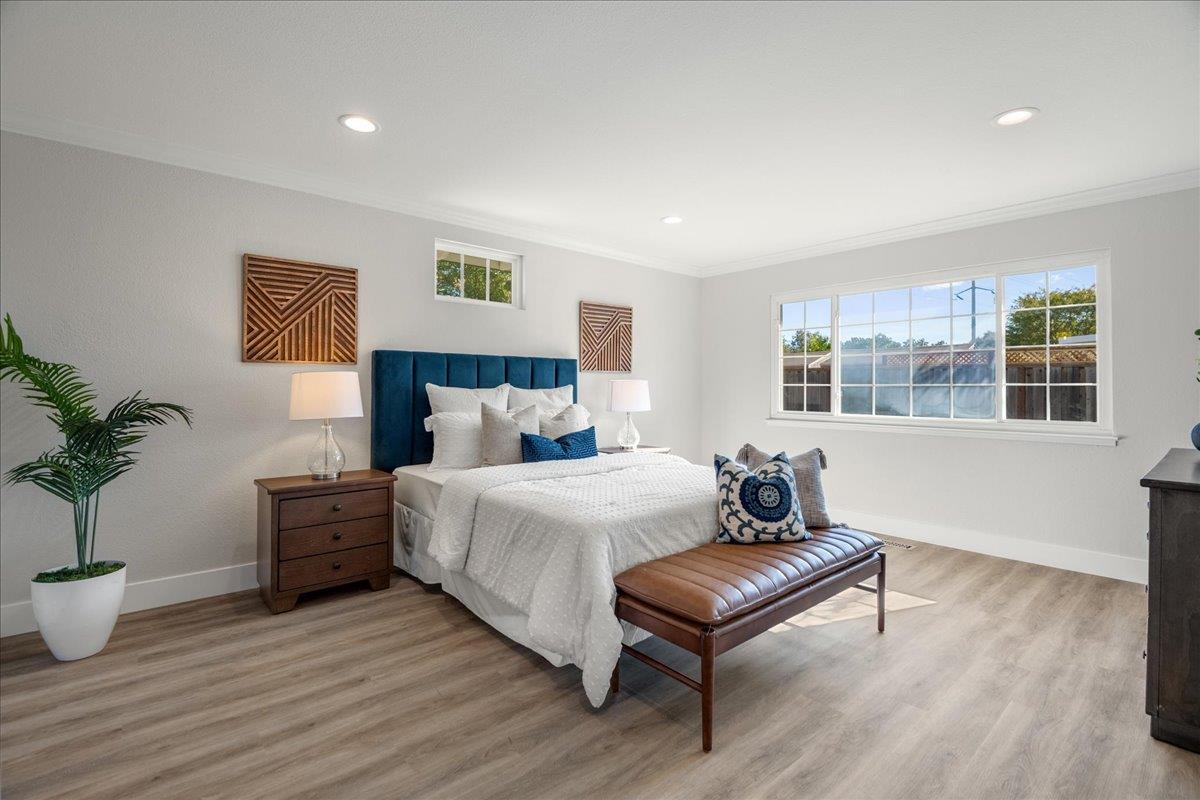 7106 Brooktree Way San Jose, CA 95120 - Photo 18 of 31 a bedroom with a bed and wooden floor