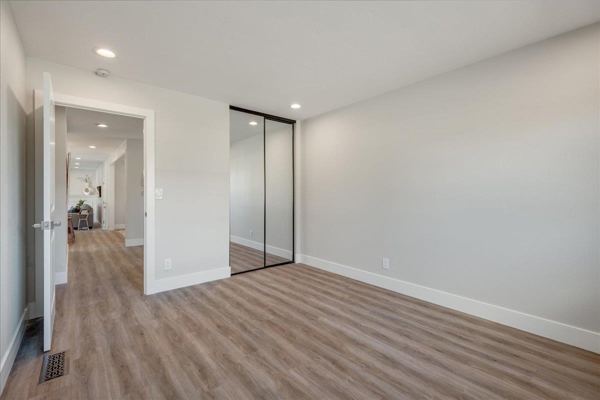 7106 Brooktree Way San Jose, CA 95120 - Photo 24 of 31 a view of hallway with wooden floor