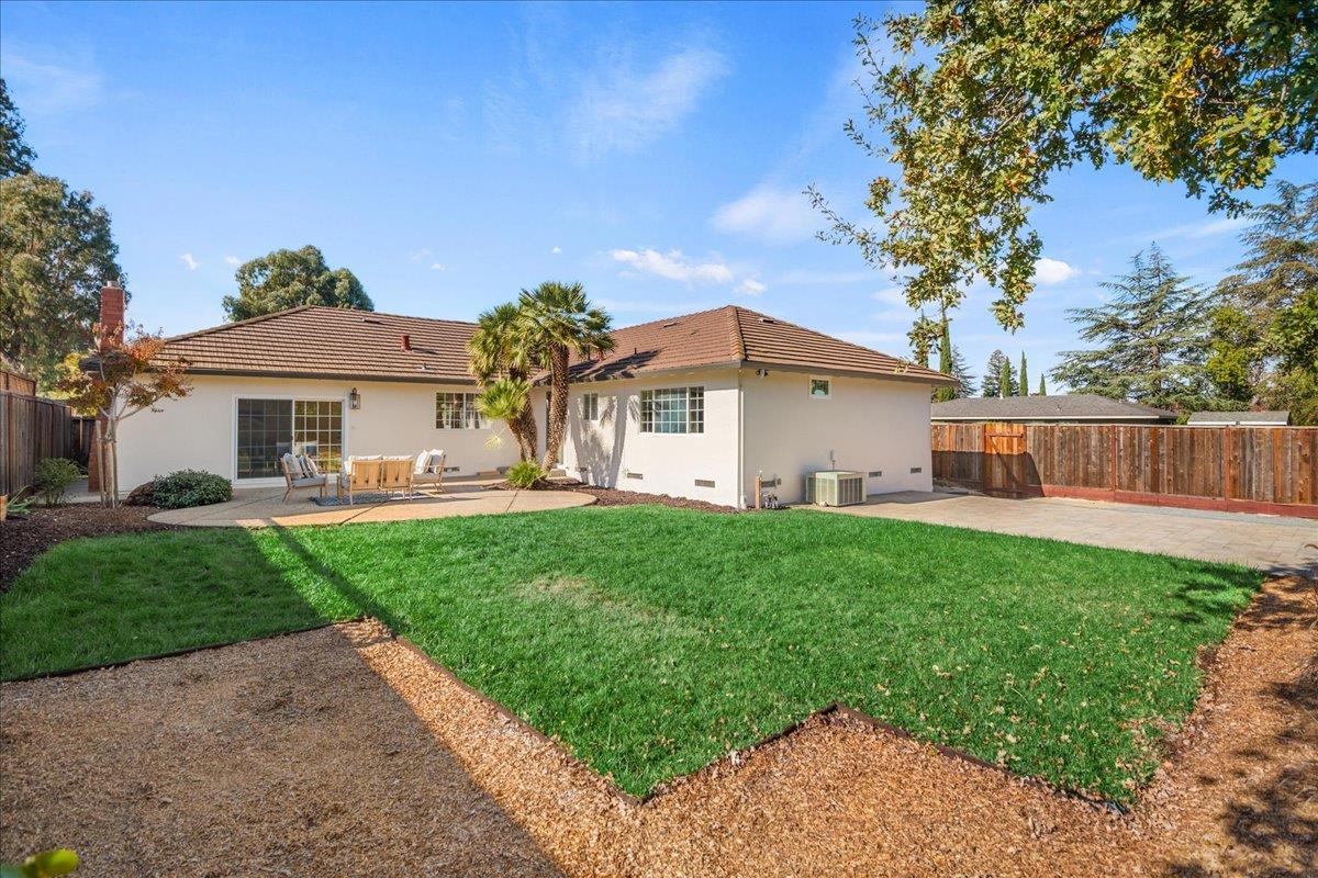 7106 Brooktree Way San Jose, CA 95120 - Photo 30 of 31 a front view of a house with garden