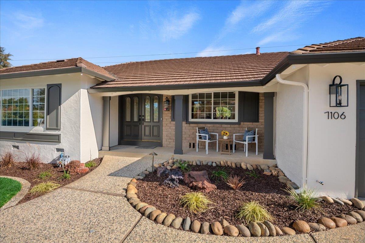7106 Brooktree Way San Jose, CA 95120 - Photo 3 of 31 a front view of a house with garden