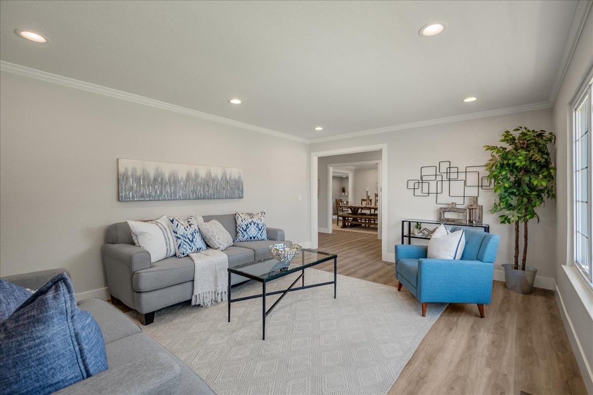 7106 Brooktree Way San Jose, CA 95120 - Photo 6 of 31 a living room with furniture and a potted plant