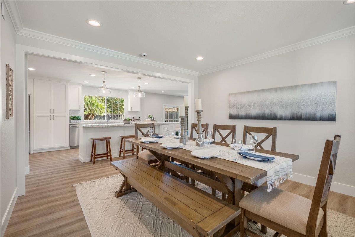 7106 Brooktree Way San Jose, CA 95120 - Photo 9 of 31 a living room with a table and chairs