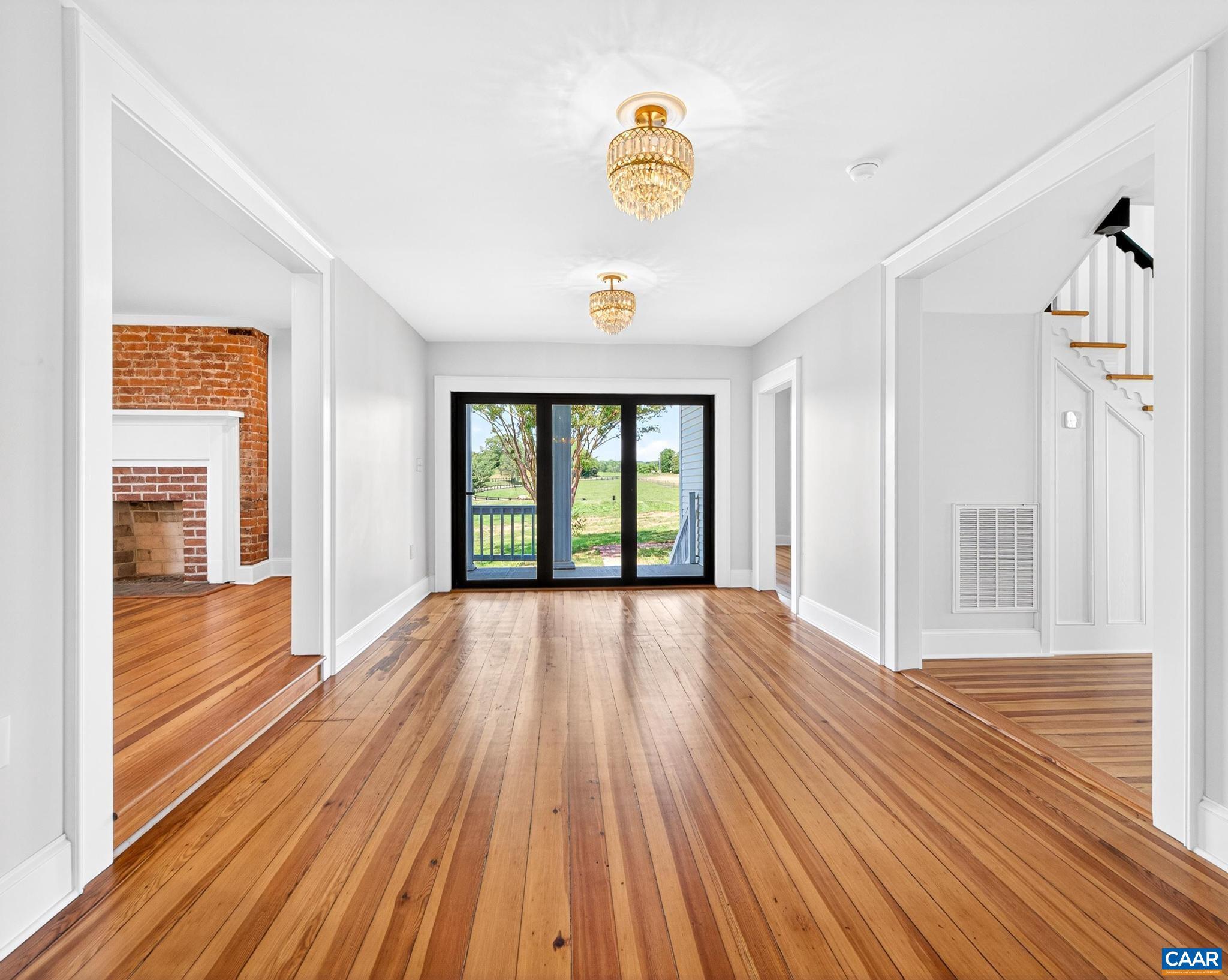 481 Race Ground Road Somerset, VA 22972 - Photo 11 of 53 a view of an empty room with wooden floor and a window