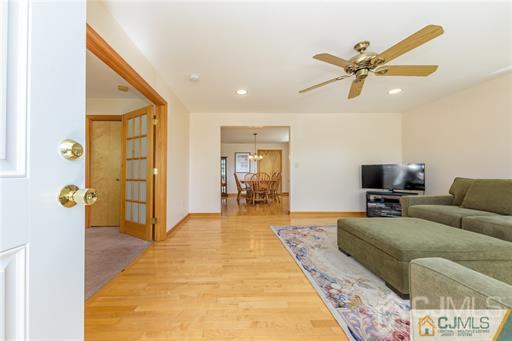 304 John Street Middlesex, NJ 08846 - Photo 12 of 25 a living room with furniture and wooden floor