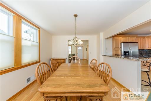 304 John Street Middlesex, NJ 08846 - Photo 17 of 25 a dining room with furniture and window