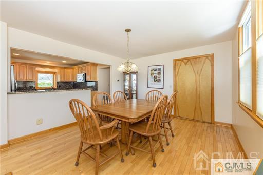 304 John Street Middlesex, NJ 08846 - Photo 18 of 25 a dining room with furniture and window