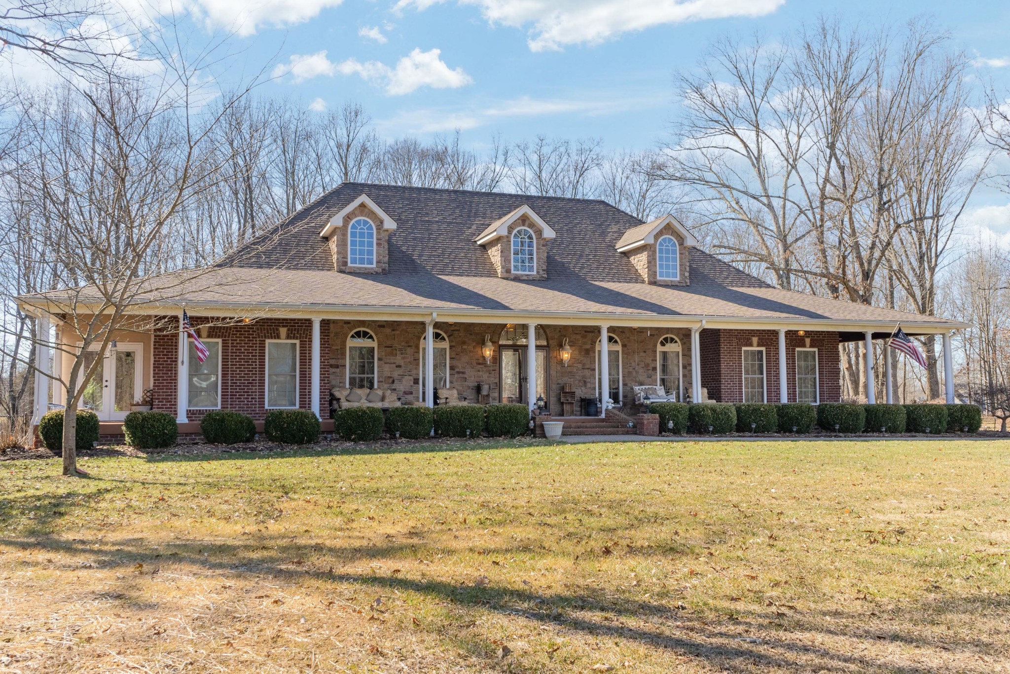 236 Raymond Hodges Road Cottontown, TN 37048 - Photo 1 of 37 a front view of a house with a yard