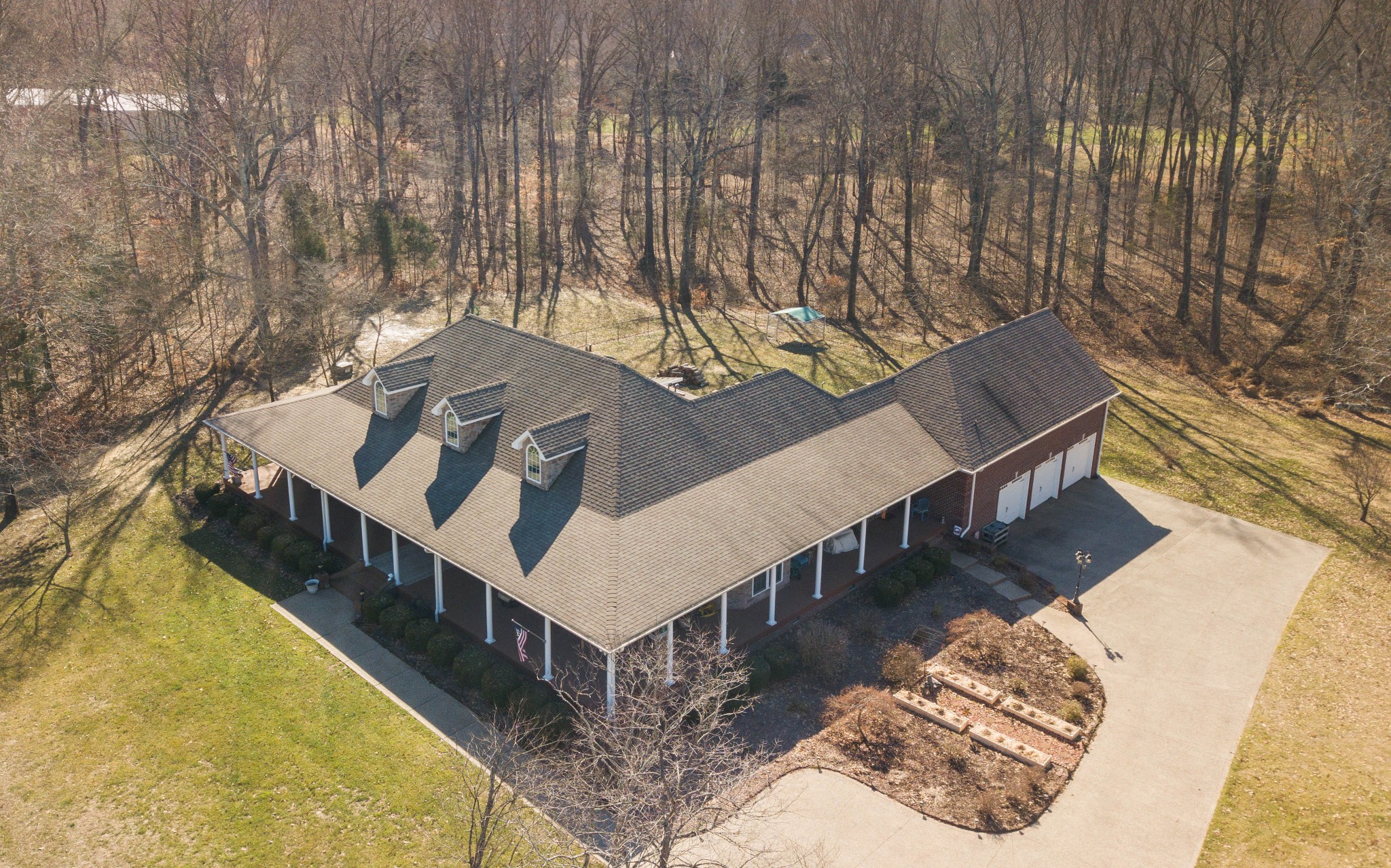 236 Raymond Hodges Road Cottontown, TN 37048 - Photo 2 of 37 a view of a balcony with chairs