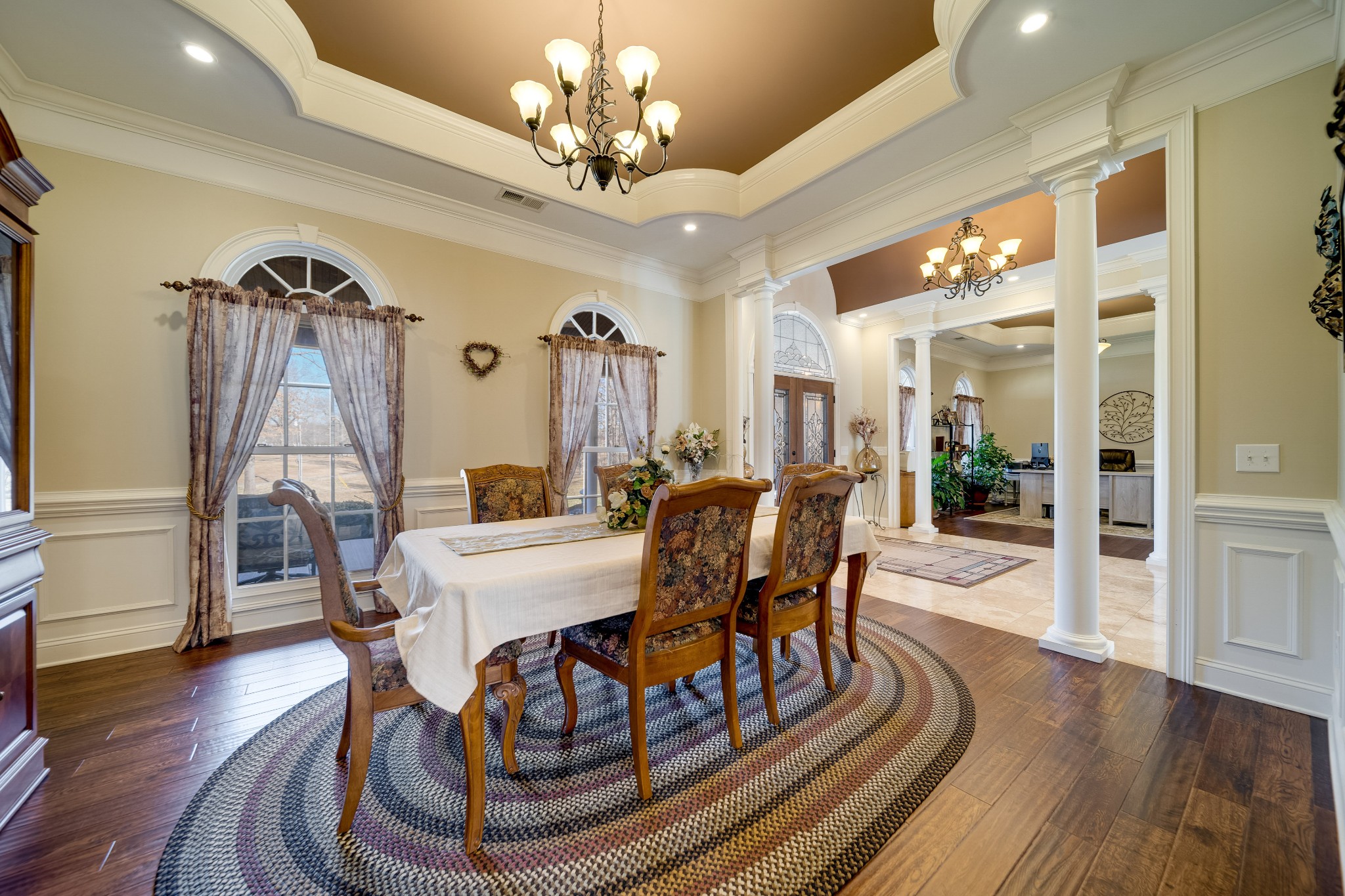 236 Raymond Hodges Road Cottontown, TN 37048 - Photo 14 of 37 a view of a dining room with furniture wooden floor and chandelier