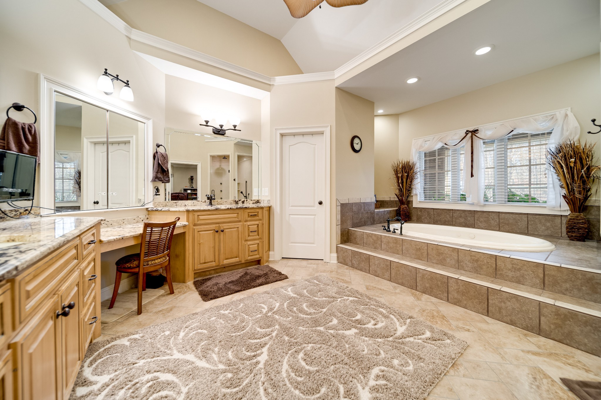 236 Raymond Hodges Road Cottontown, TN 37048 - Photo 24 of 37 a spacious bathroom with a tub sink and mirror
