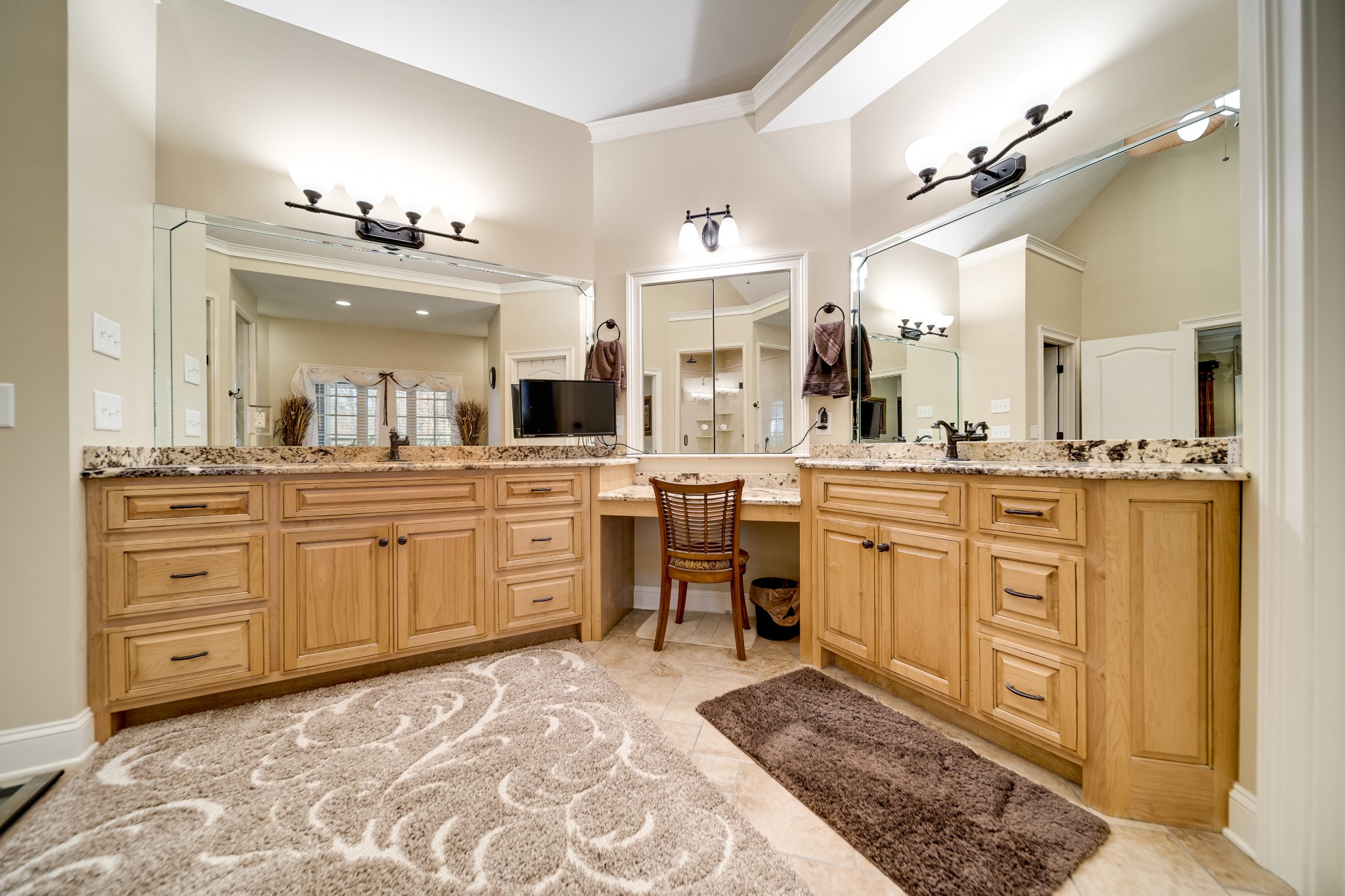 236 Raymond Hodges Road Cottontown, TN 37048 - Photo 25 of 37 a large bathroom with a sink a large mirror and a vanity