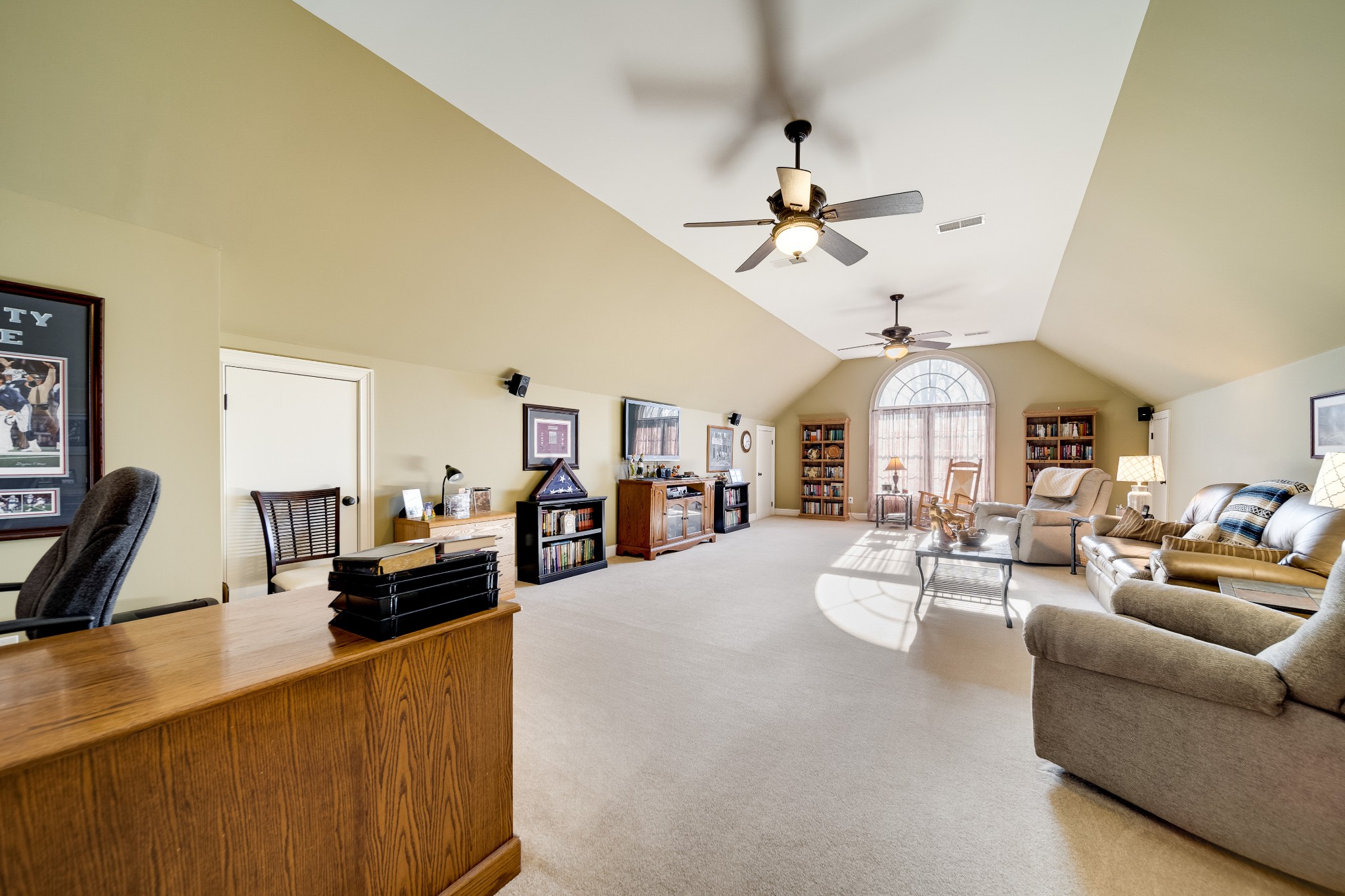 236 Raymond Hodges Road Cottontown, TN 37048 - Photo 27 of 37 a living room with furniture fireplace and a chandelier