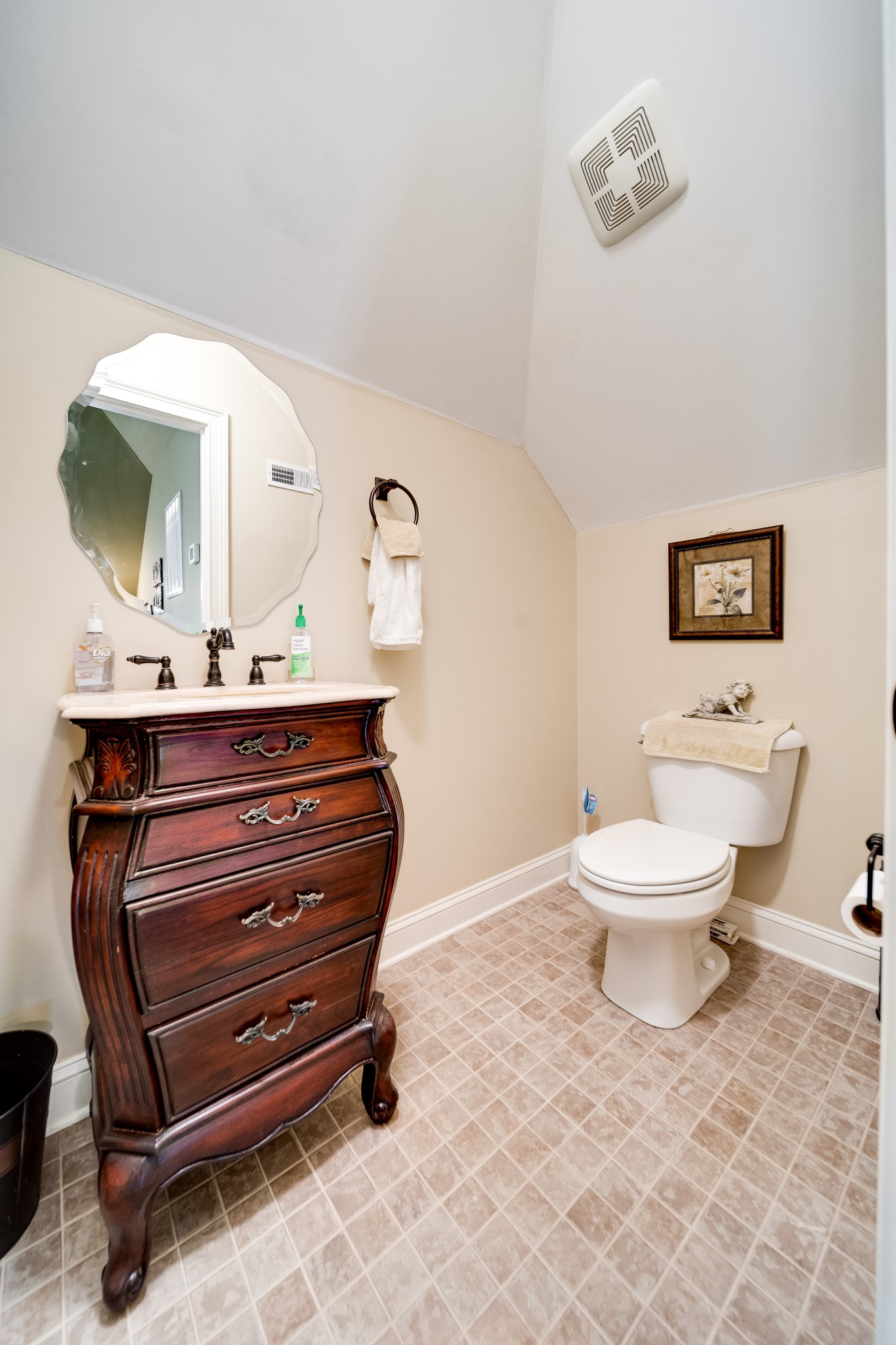 236 Raymond Hodges Road Cottontown, TN 37048 - Photo 29 of 37 a bathroom with a toilet sink and mirror